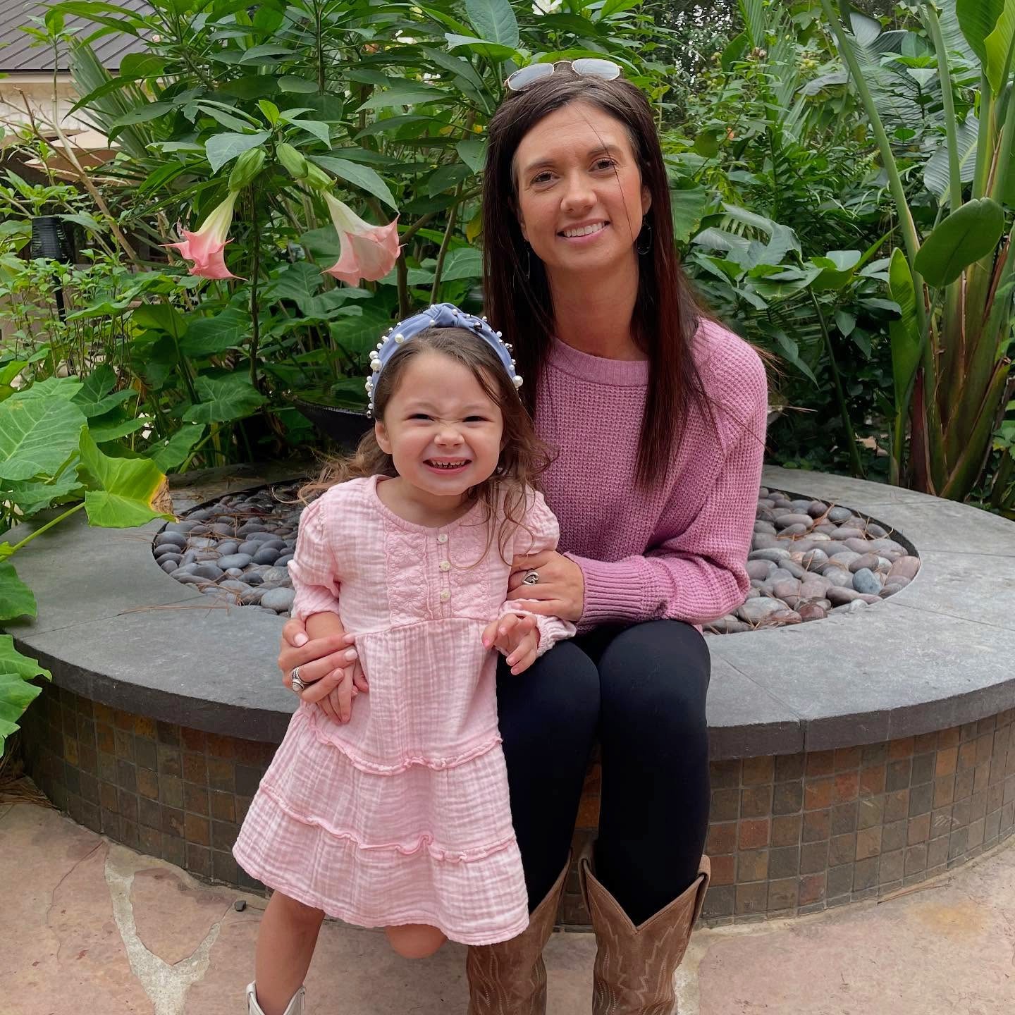Stephanie, veterinary technician at Hearthstone Animal Clinic, with her daughter Maverick
